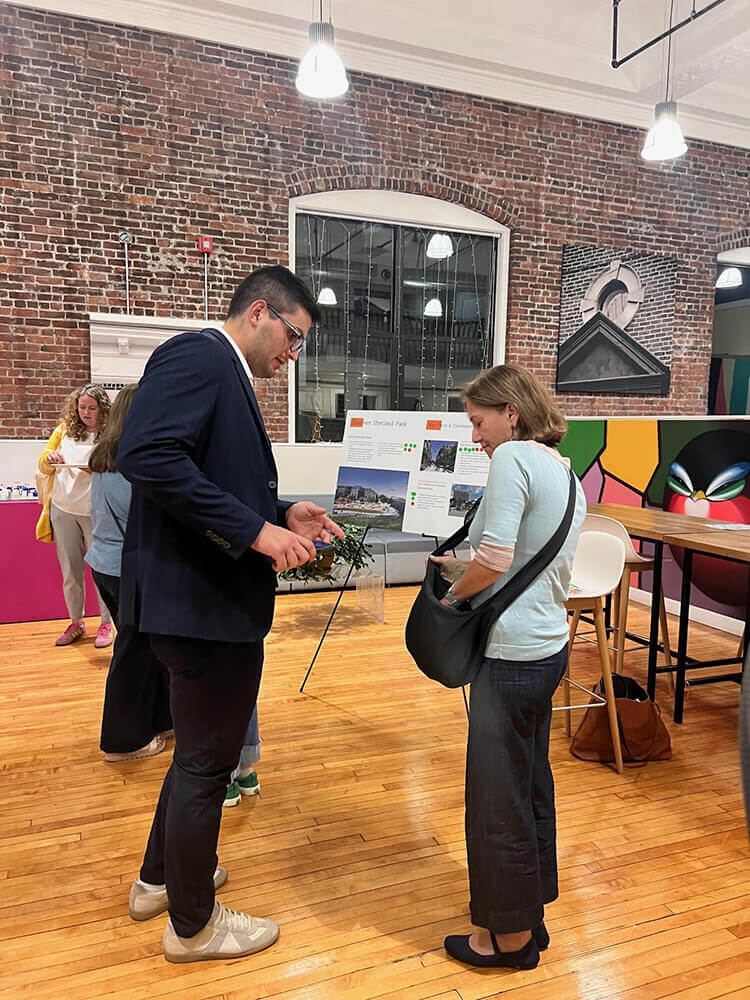 A man and woman standing and talking